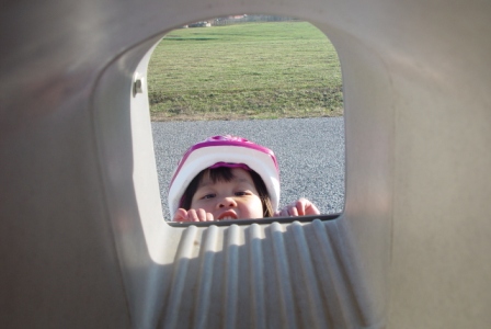 Kasen peeking through the mailbox